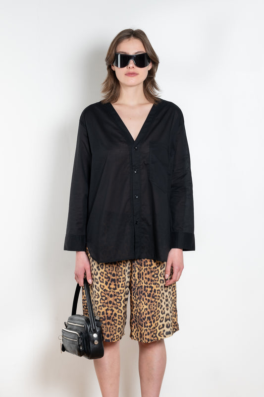 The V Shirt by Monique Van Heist is a loose fitted shirt with baseball inspired details