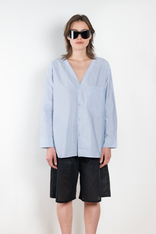The V Shirt by Monique Van Heist is a loose fitted shirt with baseball inspired details