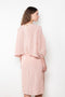 The Baby Love Top by Nackiye is a loose balloon sleeve top with pin-tuck details
