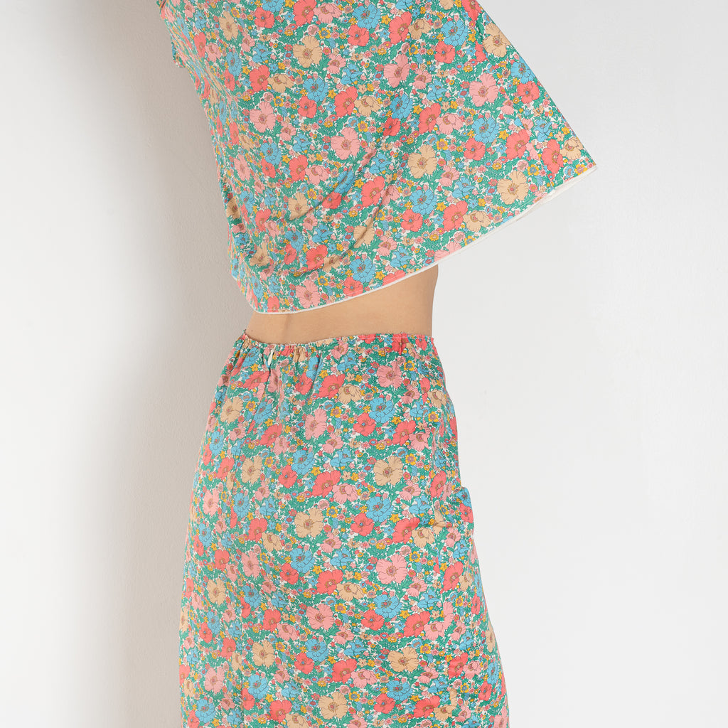 The Crayon Skirt by Nackiye is a knee length pencil skirt with raw edging and a slight white cotton petticoat reveal