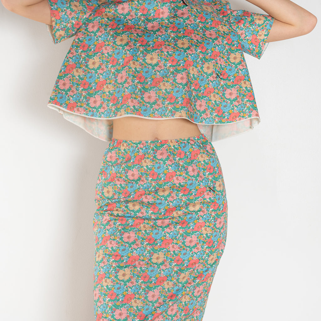 The Crayon Skirt by Nackiye is a knee length pencil skirt with raw edging and a slight white cotton petticoat reveal