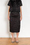 The Crayon Skirt by Nackiye is a knee length pencil skirt with raw edging and a slight noir petticoat reveal.