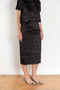 The Crayon Skirt by Nackiye is a knee length pencil skirt with raw edging and a slight noir petticoat reveal.