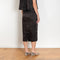 The Crayon Skirt by Nackiye is a knee length pencil skirt with raw edging and a slight noir petticoat reveal.