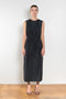 The Go Lightly Dress by Nackiye is a sleeveless ankle dress with exposed back and raw edging throughout