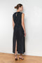 The Go Lightly Dress by Nackiye is a sleeveless ankle dress with exposed back and raw edging throughout