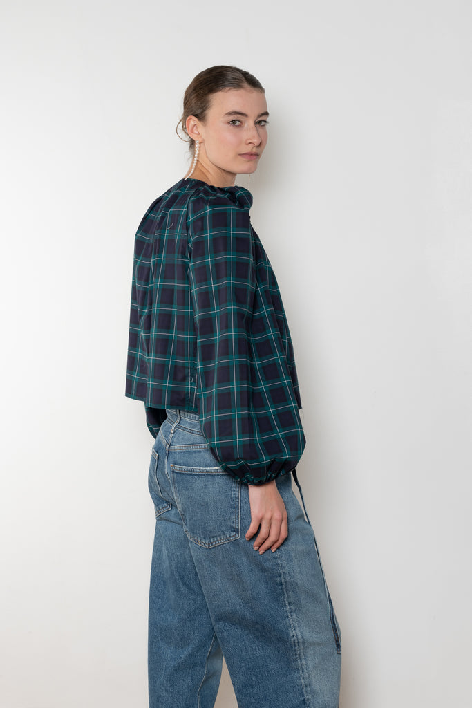 The Grand Bazaar Mini Top by Nackiye is a signature top with shawl shoulder feature and the classic double pearl neck pin in a mini version