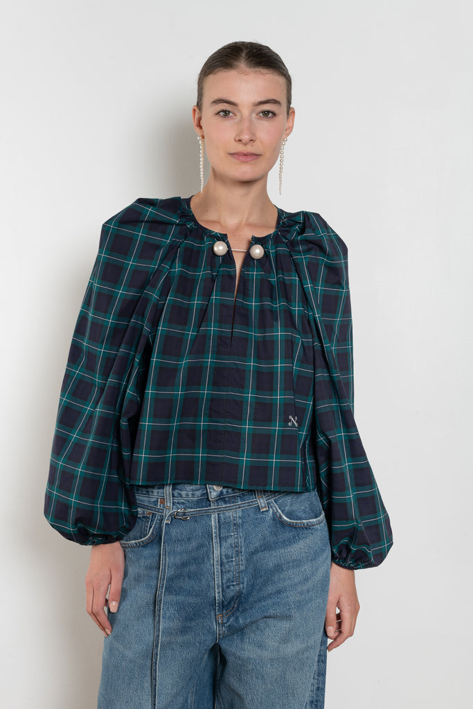 The Grand Bazaar Mini Top by Nackiye is a signature top with shawl shoulder feature and the classic double pearl neck pin in a mini version