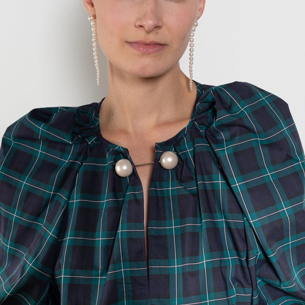 The Grand Bazaar Mini Top by Nackiye is a signature top with shawl shoulder feature and the classic double pearl neck pin in a mini version