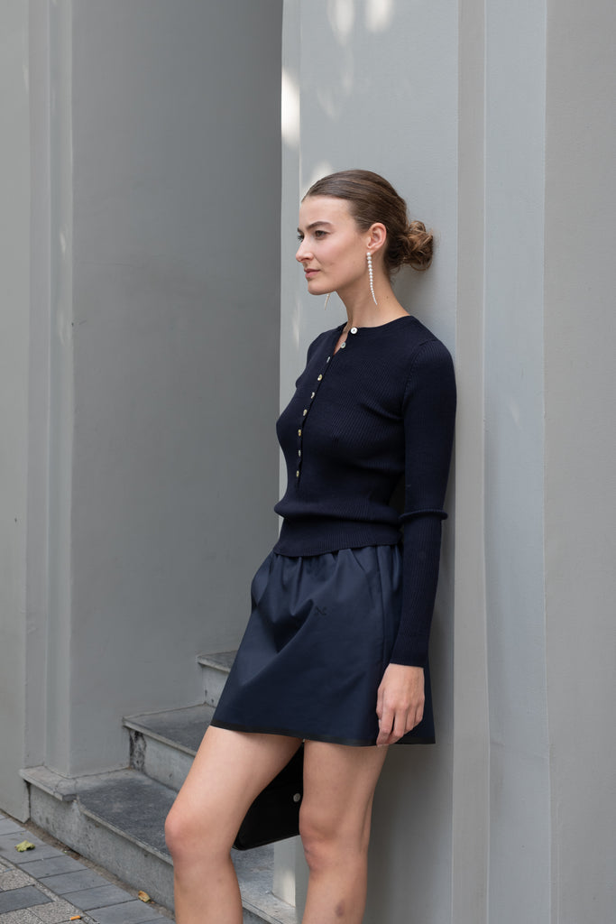 The Insider Knit Top by Nackiye is a classic button down knit top. The insider is close fitting in a soft, lightweight wool & silk
