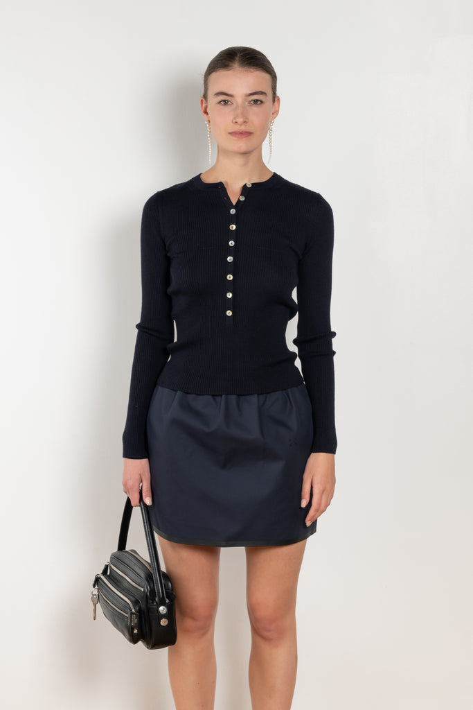 The Insider Knit Top by Nackiye is a classic button down knit top. The insider is close fitting in a soft, lightweight wool & silk