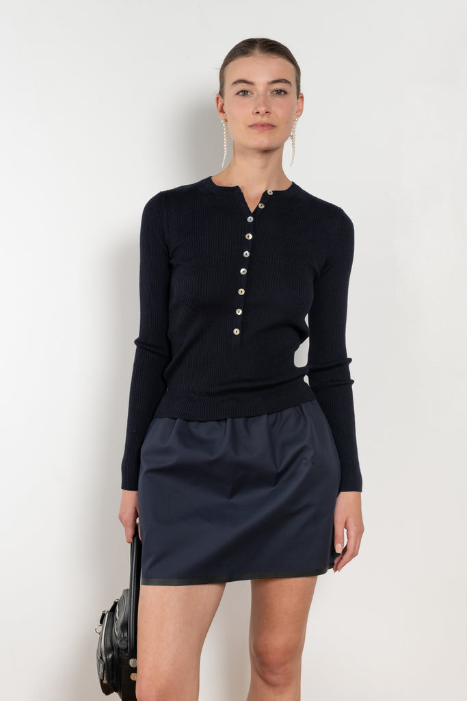 The Insider Knit Top by Nackiye is a classic button down knit top. The insider is close fitting in a soft, lightweight wool & silk