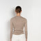 The Insider Knit Top by Nackiye is a classic button down knit top. The insider is close fitting in a soft, lightweight wool & silk, has a rounded v neckline