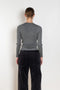The Insider Knit Top by Nackiye is a classic button down knit top. The insider is close fitting in a soft, lightweight wool &  silk