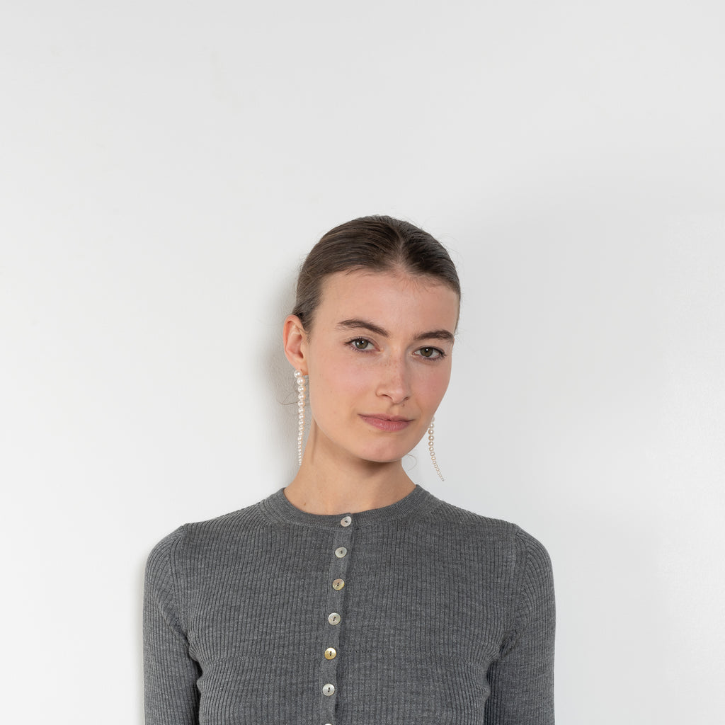 The Insider Knit Top by Nackiye is a classic button down knit top. The insider is close fitting in a soft, lightweight wool &  silk