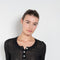 The Keep Close Top is a tightly ribbed buttoned Henley crew neck