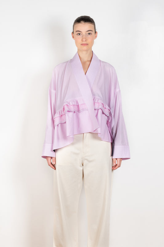 L'Orient Top by Nackiye is a cotton kimono top with mesh embellishments that can be worn as a jacket