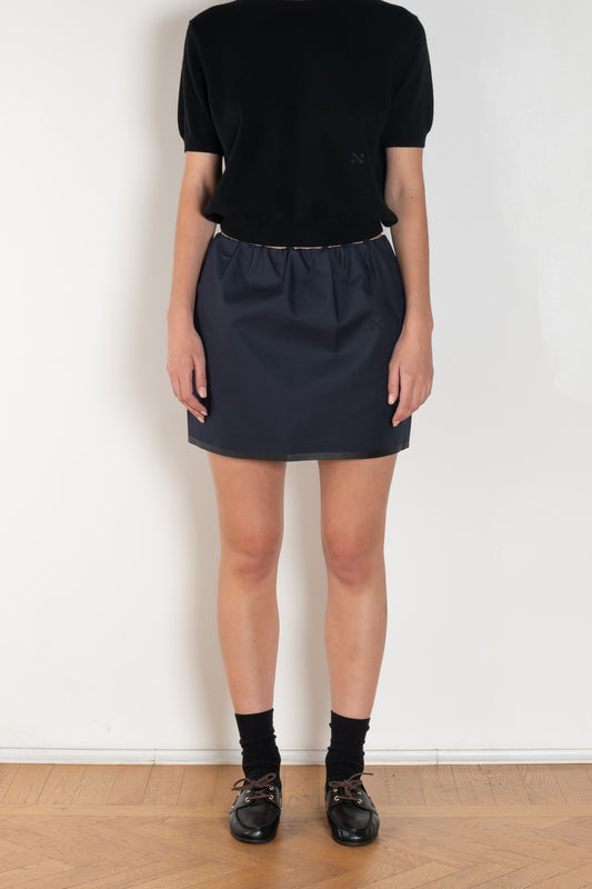 The Mini Skirt by Nackiye is gathered at the waist and featuring two side pockets, the little mini also has raw edging embellished with a rubber like piping