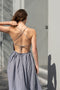 The Park Life Dress by Nackiye is a cross back dress with frill edging at the waist