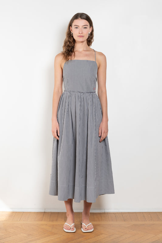 The Park Life Dress by Nackiye is a cross back dress with frill edging at the waist