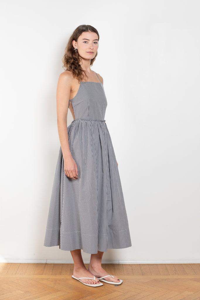 The Park Life Dress by Nackiye is a cross back dress with frill edging at the waist