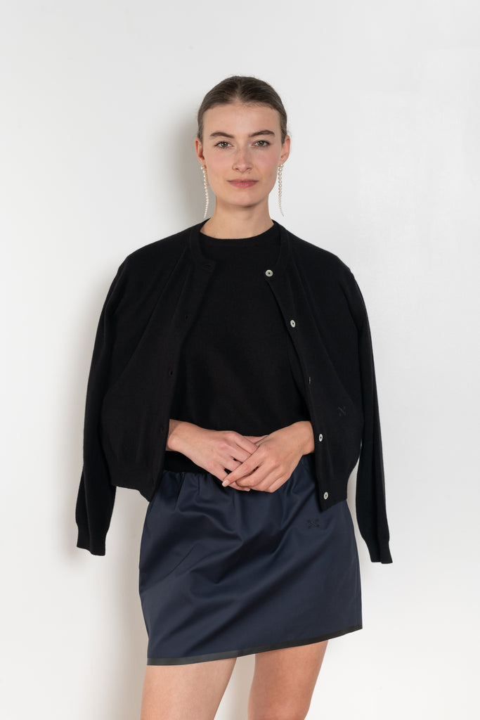 The Pearl Top by Nackiye is a crew neck short sleeved sweater in a lightweight cashmere with lightly ribbed sleeve hems and bottom hem