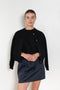 The Pearl Top by Nackiye is a crew neck short sleeved sweater in a lightweight cashmere with lightly ribbed sleeve hems and bottom hem