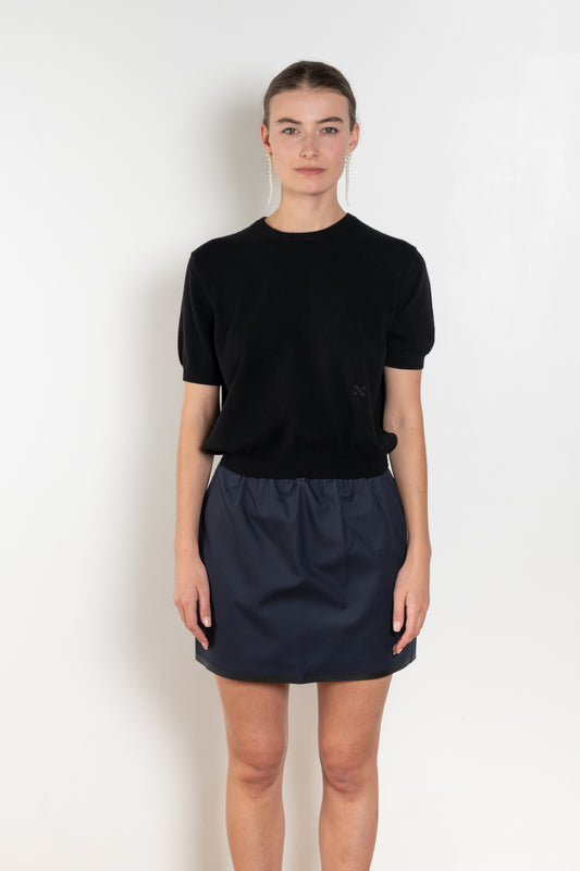 The Pearl Top by Nackiye is a crew neck short sleeved sweater in a lightweight cashmere with lightly ribbed sleeve hems and bottom hem