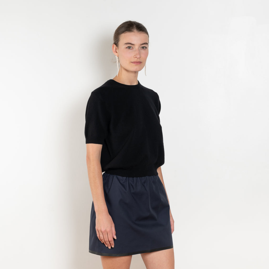 The Pearl Top by Nackiye is a crew neck short sleeved sweater in a lightweight cashmere with lightly ribbed sleeve hems and bottom hem