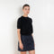 The Pearl Top by Nackiye is a crew neck short sleeved sweater in a lightweight cashmere with lightly ribbed sleeve hems and bottom hem