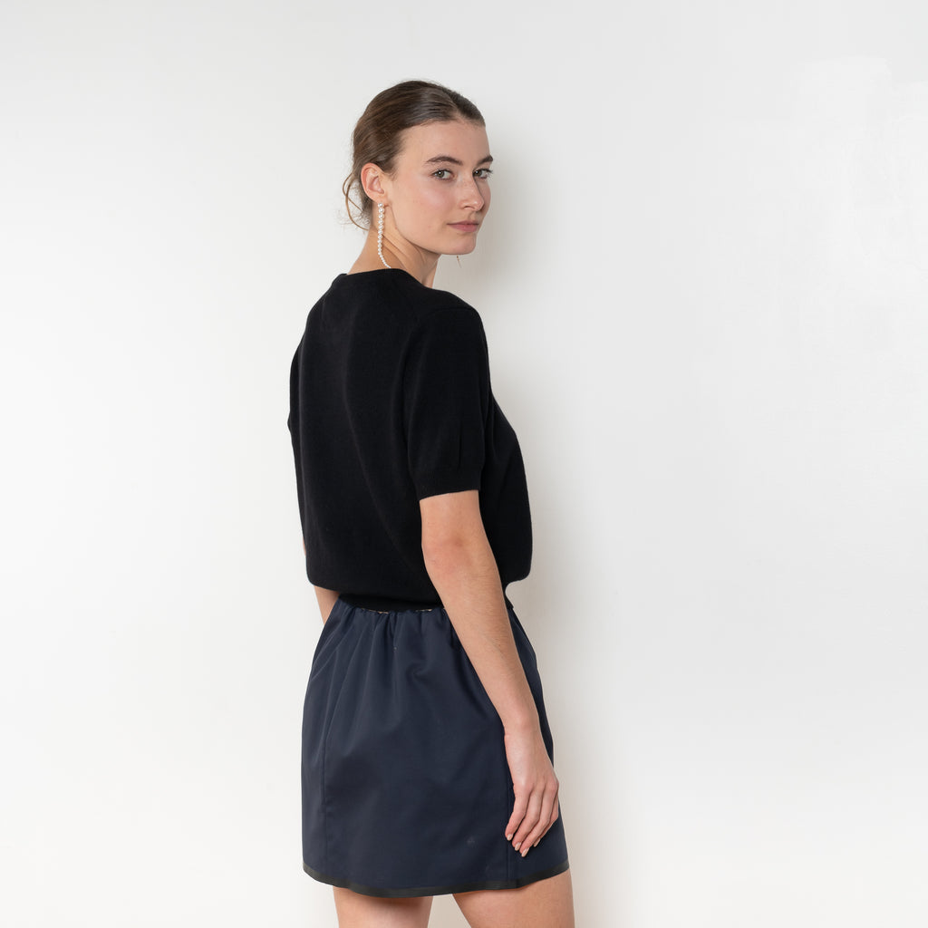 The Pearl Top by Nackiye is a crew neck short sleeved sweater in a lightweight cashmere with lightly ribbed sleeve hems and bottom hem