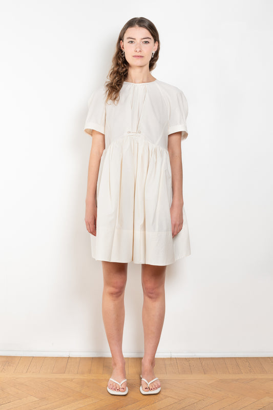 The Peony Dress by Nackiye is a sweet short babydoll inspired dress with a detachable collar detail and an pearl pin embellishment