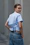 The Pixie Top by Nackiye is a fresh take on the classic shirt. Sleek A-line silhouette, short sleeves a detachable back belt
