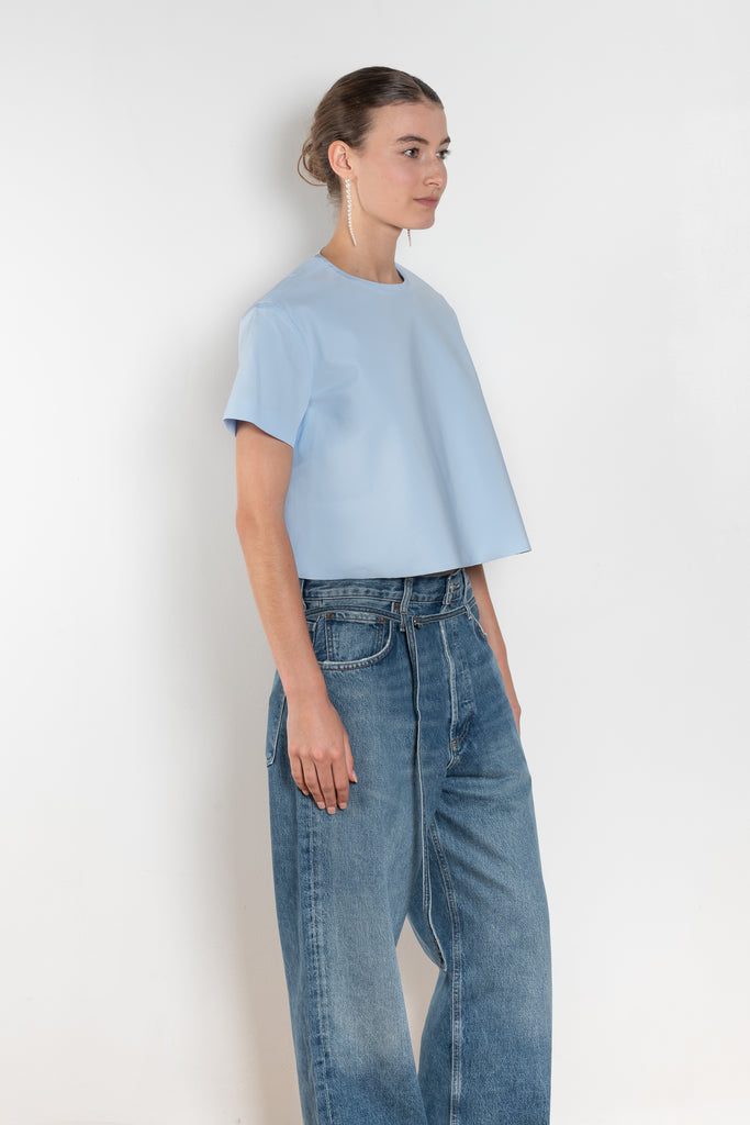 The Pixie Top by Nackiye is a fresh take on the classic shirt. Sleek A-line silhouette, short sleeves a detachable back belt