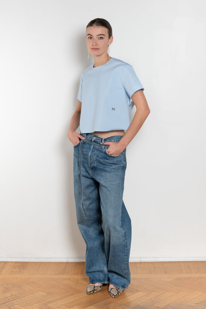 The Pixie Top by Nackiye is a fresh take on the classic shirt. Sleek A-line silhouette, short sleeves a detachable back belt