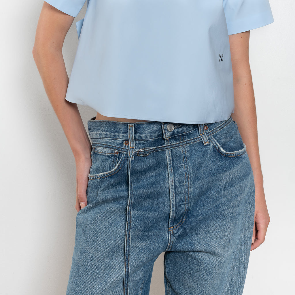 The Pixie Top by Nackiye is a fresh take on the classic shirt. Sleek A-line silhouette, short sleeves a detachable back belt