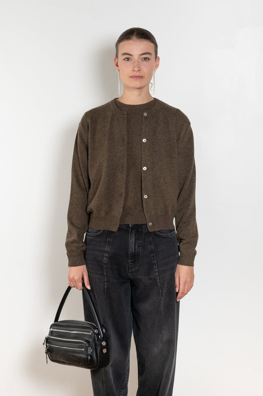 The Sea Shell Cardigan by Nackiye is a beautiful lightweight cashmere cardigan with mother of pearl buttons and lightly ribbed cuffs
