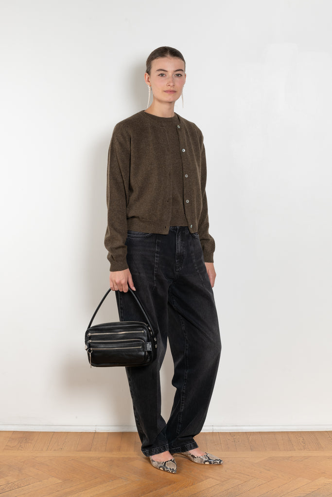 The Sea Shell Cardigan by Nackiye is a beautiful lightweight cashmere cardigan with mother of pearl buttons and lightly ribbed cuffs
