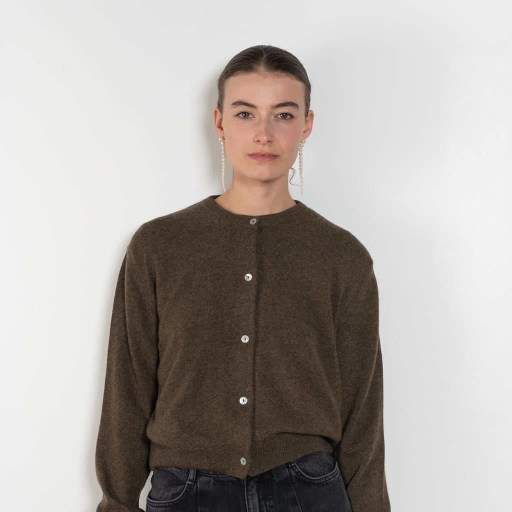 The Sea Shell Cardigan by Nackiye is a beautiful lightweight cashmere cardigan with mother of pearl buttons and lightly ribbed cuffs