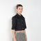The Shortcut Shirt by Nackiye is a crop shirt with pointy collar and faux front pockets