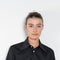 The Shortcut Shirt by Nackiye is a crop shirt with pointy collar and faux front pockets