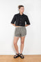 The Shortcut Shirt by Nackiye is a crop shirt with pointy collar and faux front pockets