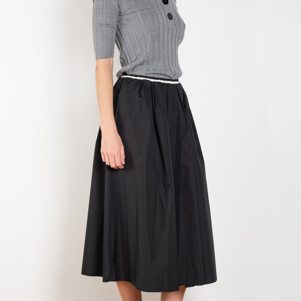 The Summer Wine Skirt by Nackiye is a gathered A-line circle skirt with cream waist frill edging and detached elastic inner waist