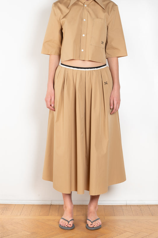The Summer Wine Skirt by Nackiye is a gathered A-line circle skirt with cream waist frill edging and detached elastic inner waist.