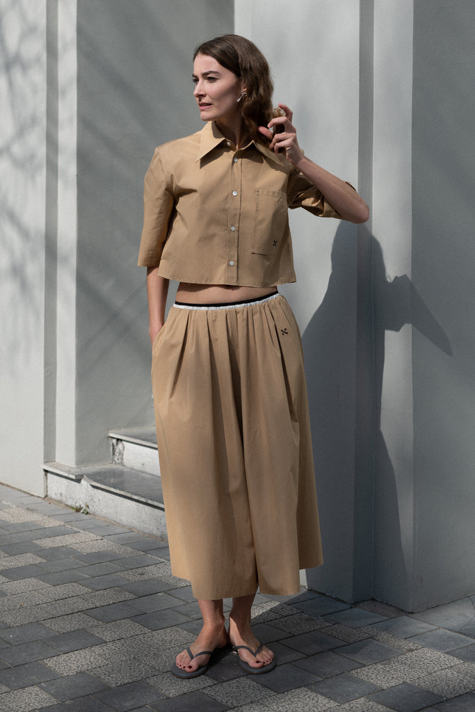 The Summer Wine Skirt by Nackiye is a gathered A-line circle skirt with cream waist frill edging and detached elastic inner waist.