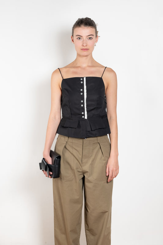 The Surf Rider Top by Nackiye is a delicate strappy top in cotton with a ruffle hem