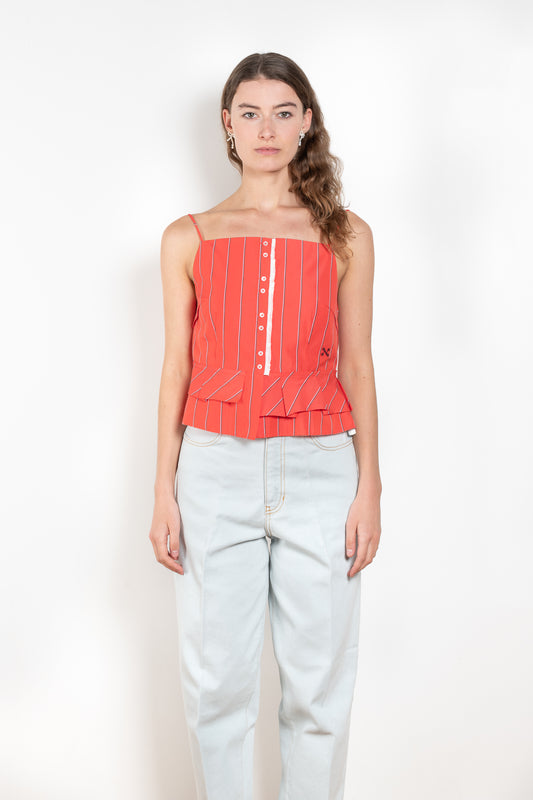 The Surf Rider Top by Nackiye is a delicate strappy top in cotton with a ruffle hem