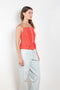 The Surf Rider Top by Nackiye is a delicate strappy top in cotton with a ruffle hem