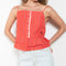The Surf Rider Top by Nackiye is a delicate strappy top in cotton with a ruffle hem