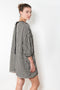 The Baby Love Dress by Nackiye is a loose balloon sleeve dress with pin-tuck details